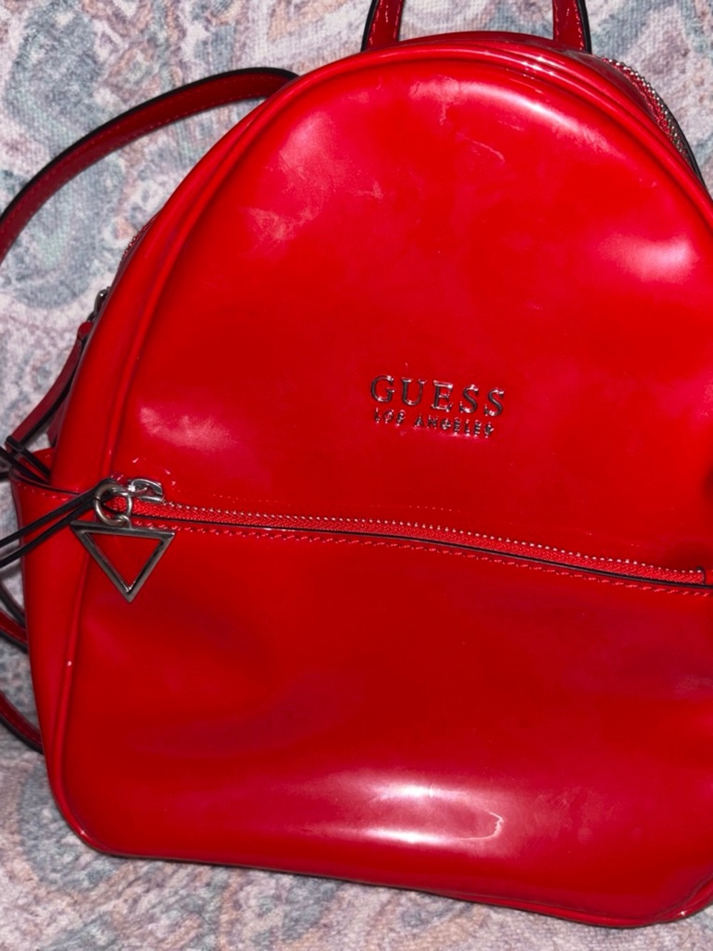 GUESS Red Patent Backpack with Triangle Charm